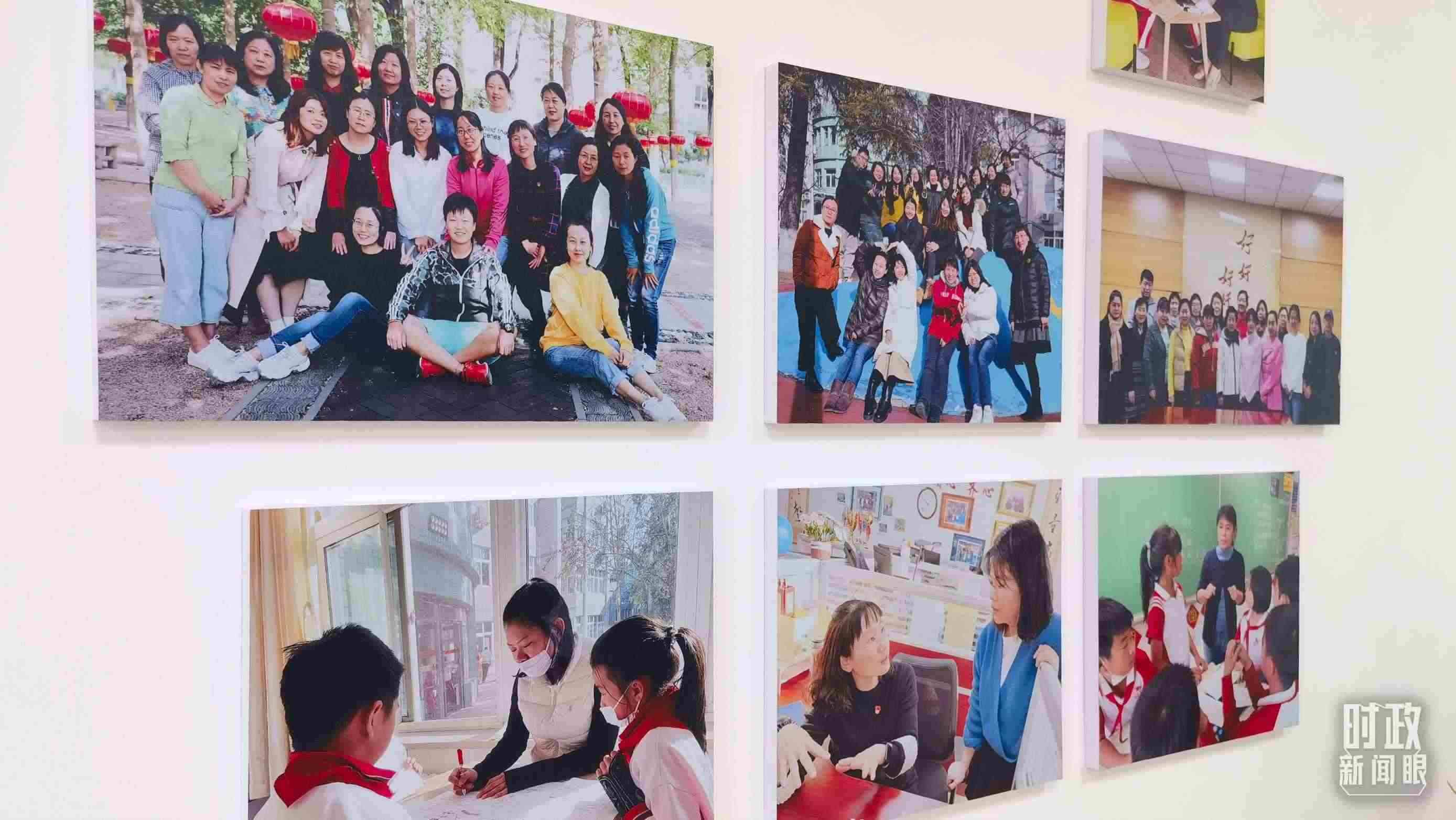 △五年級教師辦公室內(nèi)的合影展板。（總臺央視記者賈林拍攝）