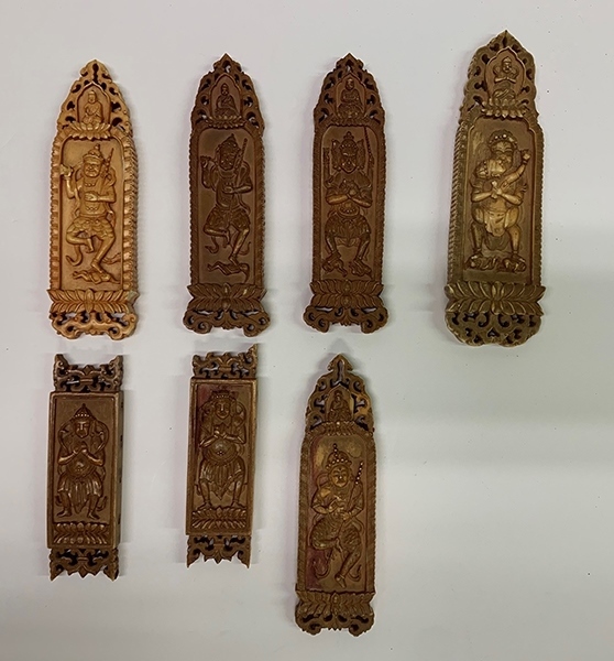 木雕牌飾（暫定名）。國(guó)家文物局供圖