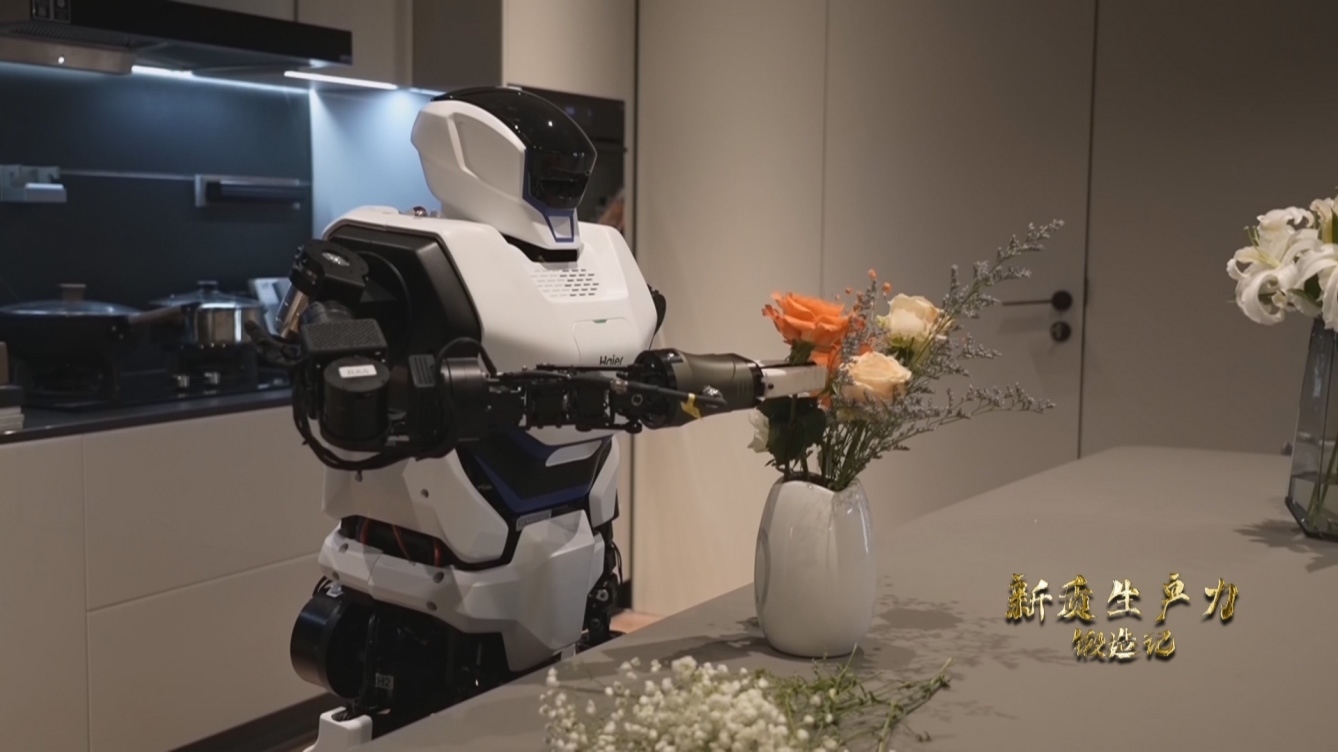 人形機(jī)器人插花。